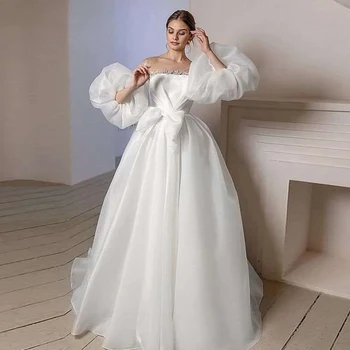 Секси дантелени сватбени рокли в бяло с отворени рамене, пищните ръкави и отворена гърба си, елегантна сватбена рокля в стил принцеса, плажен стил 2023