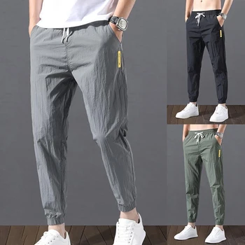 Ежедневни спортни панталони мъжки летни тънки панталони с еластичен ластик на талията, бързо съхнещи модни тесни мъжки панталони са нови